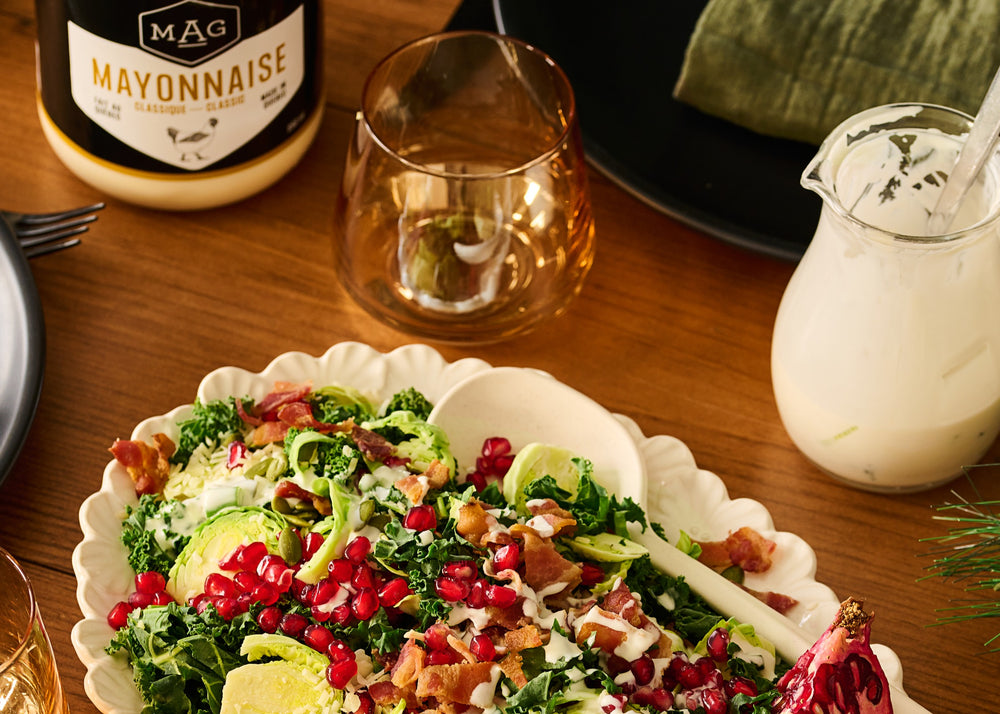 Salade des fêtes au kale, vinaigrette érable fines herbes.